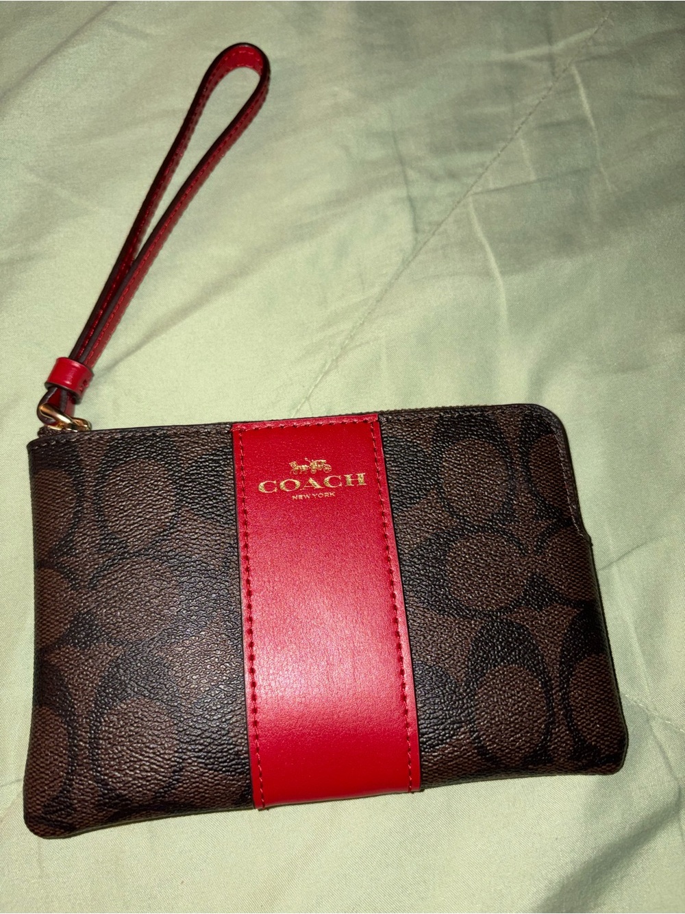 Coach Brown Signature Wristlet with Red Center Stripe